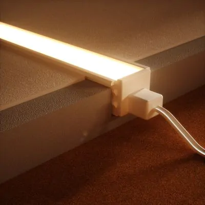 NEOLINEAR Recessed Neon Flex — warm white plastered chipboard installation