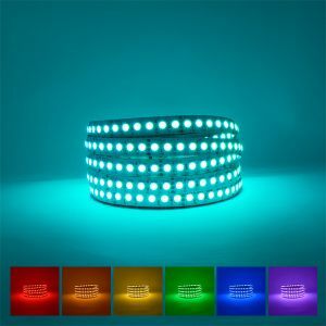 RGB LED Strip for production coiled on blue background with available colours displayed underneath 
