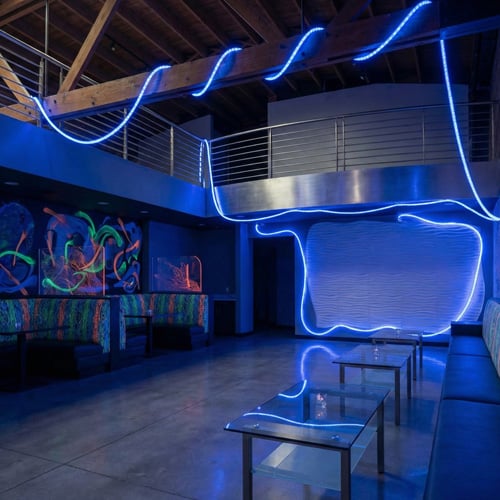 Club interior illuminated with UV Flexi Rope lighting